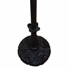 Elegant brown and white floor lamp featuring a decorative base with intricate floral designs and a white glass bowl shade.