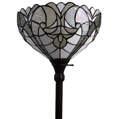 62" brown torchiere floor lamp featuring a white Tiffany-style glass dome shade with intricate floral patterns.