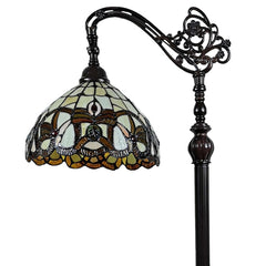 62" brown metal arched floor lamp featuring an amber and red stained glass shade with intricate floral designs.