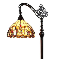 62" Brown Metal Arched Floor Lamp featuring an amber and red stained glass shade with floral design and ornate detailing.