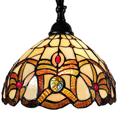 Stained glass shade of a 62" brown metal arched floor lamp featuring amber and red floral designs.