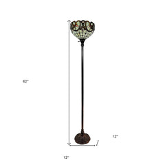 62" beige torchiere floor lamp with a glass dome shade featuring red and white flowers. Elegant design with a sturdy base.