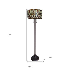 63" beige metal torchiere floor lamp with a floral glass drum shade featuring red and white flowers. Base diameter 16".