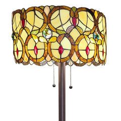 Beige metal torchiere floor lamp with a 63" height, featuring a decorative glass drum shade with red and white flower designs