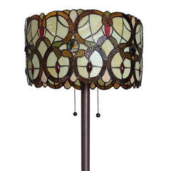 Beige metal torchiere floor lamp with a decorative red and white flowers glass drum shade. Stands 63 inches tall.
