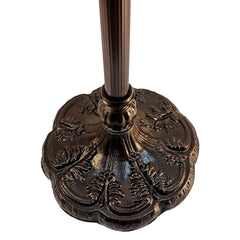 Beige metal floor lamp base with intricate floral design, supporting a two-light torchiere style.