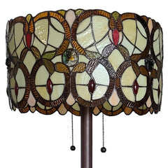 Beige metal 63" torchiere floor lamp featuring a red and white flowers glass drum shade with intricate stained glass design.