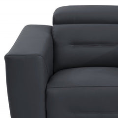 Dark gray Italian leather power recliner chair with sleek armrests and modern design. Ideal for comfort and style.