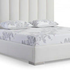 White wood and faux leather queen bed frame with USB, featuring a sleek design and floral-patterned bedding.