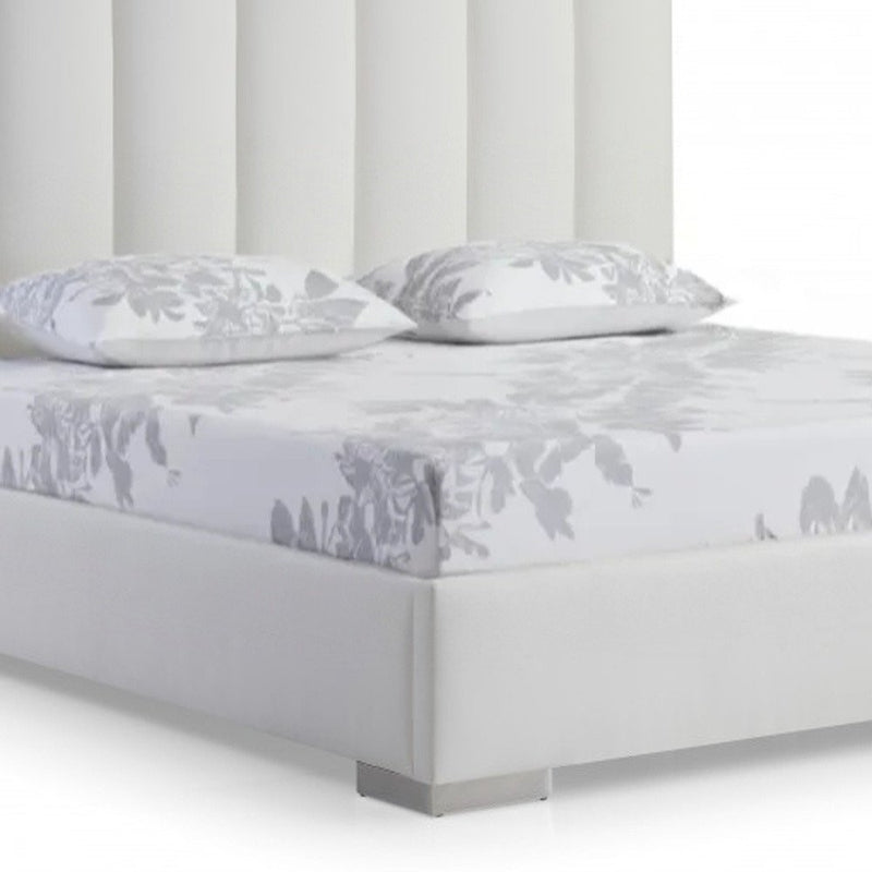 White wood and faux leather queen bed frame with USB, featuring a sleek design and floral-patterned bedding.
