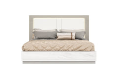 White and taupe wood queen bed frame with a sleek design, featuring a padded headboard and decorative pillows.