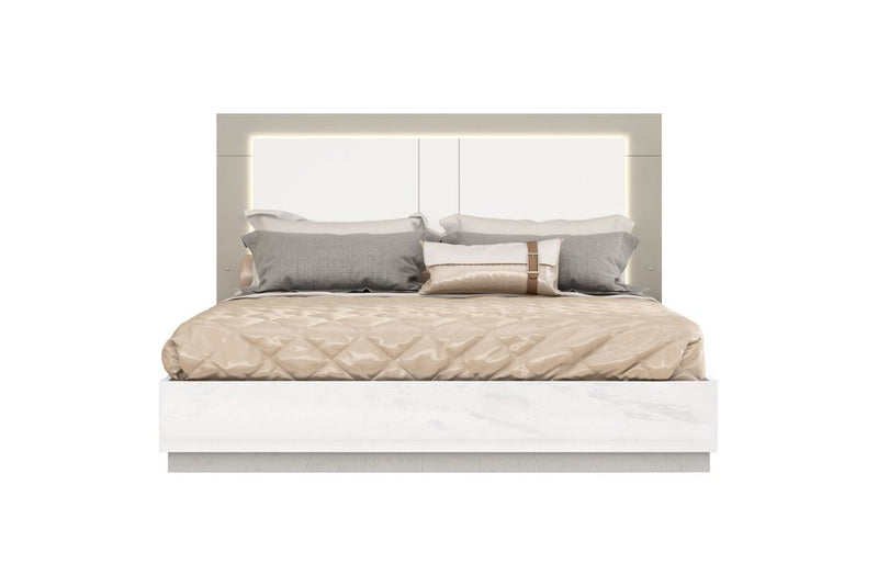 White and taupe wood queen bed frame with a sleek design, featuring a padded headboard and decorative pillows.