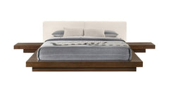 Walnut and white wood king bed frame with faux leather headboard and attached nightstands, featuring a modern design.