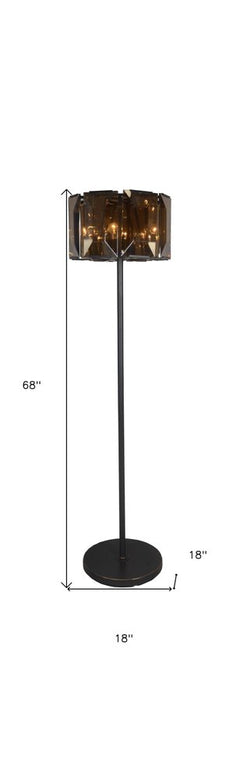 68" dark bronze floor lamp with an amber beveled glass drum shade, featuring a sleek design and sturdy base.