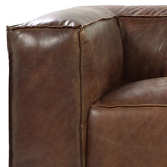98" brown top grain leather sofa featuring plush cushioning and sleek black legs, ideal for modern living spaces.