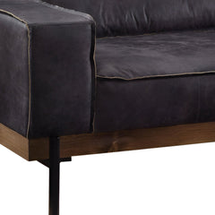 Ebony top grain leather sofa with black legs, featuring a sleek design and plush seating. Ideal for modern living spaces.