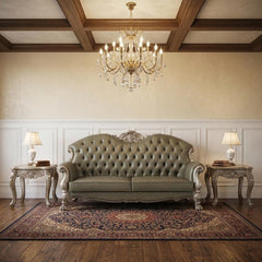 96" Bone Faux Leather Sofa with tufted design, white legs, and toss pillows, set in an elegant room with a chandelier.