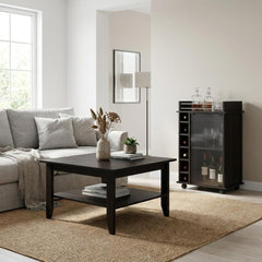 22" Brown and Black Open Shelving Bar Cart and Coffee Table in a modern living room setting with a sofa and decorative elemen