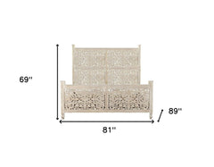 White Carved Floral Distressed Solid Wood King Bed Frame with intricate floral designs, measuring 69" high, 81" wide, and 89"