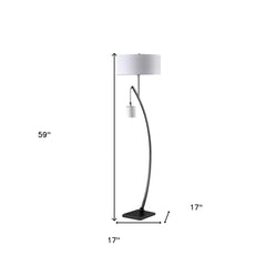 Matte black dual arc floor lamp with white drum shade, measuring 59" in height and 17" in width. Elegant design.
