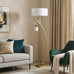 59" Gold and White Arc Floor Lamp with a white fabric drum shade, featuring a sleek gold base and a modern design in a cozy l