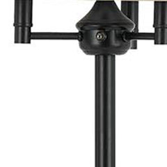 Bronze four light floor lamp with a beige fabric square shade, featuring a sleek design and sturdy base.