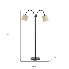 65" bronze floor lamp with two curved arms and tan square shades, featuring a round base and elegant traditional design.