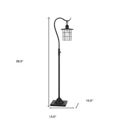 60" Antiqued Bronze Lantern Style Floor Lamp with a glass and metal shade, featuring a curved arm and square base.