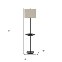 62" bronze tray table floor lamp with a beige drum shade, featuring a round base and a built-in tray for convenience.