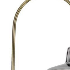 61" Brass Adjustable Arc Floor Lamp featuring an antiqued brass mirrored glass novelty shade and a sleek curved design.