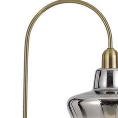 61" Brass Adjustable Arc Floor Lamp featuring an antiqued brass mirrored glass shade, elegant and modern design.