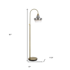 61" Brass Adjustable Arc Floor Lamp with an antiqued brass mirrored glass shade, featuring a sleek design and sturdy base.