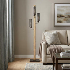 61" brown three-light traditional floor lamp with black novelty shade, featuring a wooden base and modern design, placed besi