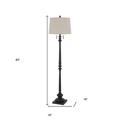 63" rust two-light floor lamp with a beige fabric square shade, featuring a decorative base and elegant design.