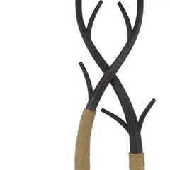 Black metal floor lamp featuring a unique tree branch design with tan rope accents and a fabric shade.