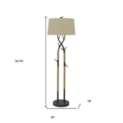 55" black metal and rope floor lamp with a tan fabric shade, featuring a unique tree branch design. Base measures 18".