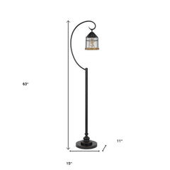 63" bronze traditional floor lamp with a curved design and cage-style shade, featuring a sturdy base. Dimensions: 63" H x 15"