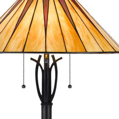 61" Bronze two-light floor lamp featuring a red and ivory abstract Tiffany glass empire shade with a traditional design.