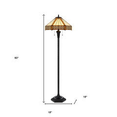60" bronze floor lamp with an orange and ivory abstract Tiffany glass empire shade, featuring a traditional design and a stur