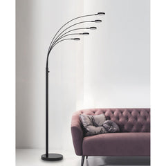 82" Bronze Five Light LED Arc Floor Lamp with curved arms and modern design, placed next to a stylish tufted sofa.