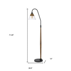 71" brown traditional floor lamp with a clear glass empire shade, featuring a curved arm and a sturdy base.