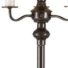 Bronze metal four-light floor lamp with a beige fabric square shade, featuring elegant curved arms and a classic design.