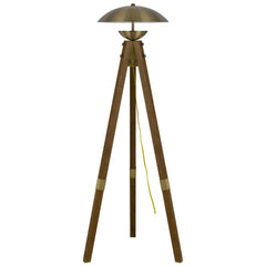 55" Brass Tripod Floor Lamp with an antiqued brass dome shade and wooden tripod base, featuring a yellow power cord.