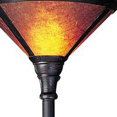 71" rusted torchiere floor lamp featuring a brown dome shade with a warm, glowing light effect. Elegant and stylish design.