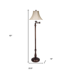 62" rusted swing arm floor lamp with a champagne bell shade, featuring a decorative base and adjustable arm.