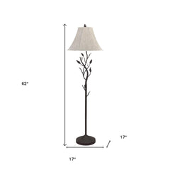 62" grey traditional floor lamp with a brown bell shade and a decorative branch design. Dimensions: 62" height, 17" width.