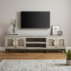 93" White Solid Wood Cabinet Enclosed Storage Distressed TV Stand featuring circular door designs, open shelves, and a neutra