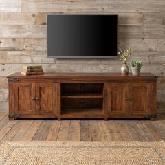 93" Brown Solid Wood Cabinet Enclosed Storage Distressed TV Stand with four doors, open shelf, and rustic decor elements.