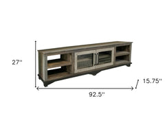 93" Brown Solid Wood Cabinet Enclosed Storage Distressed TV Stand with shelves and glass doors, measuring 92.5" x 27" x 15.75