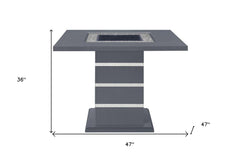 47" dark gray square bar table with silver and black glass accents, faux crystal details, and a sturdy wood base. Height: 36"